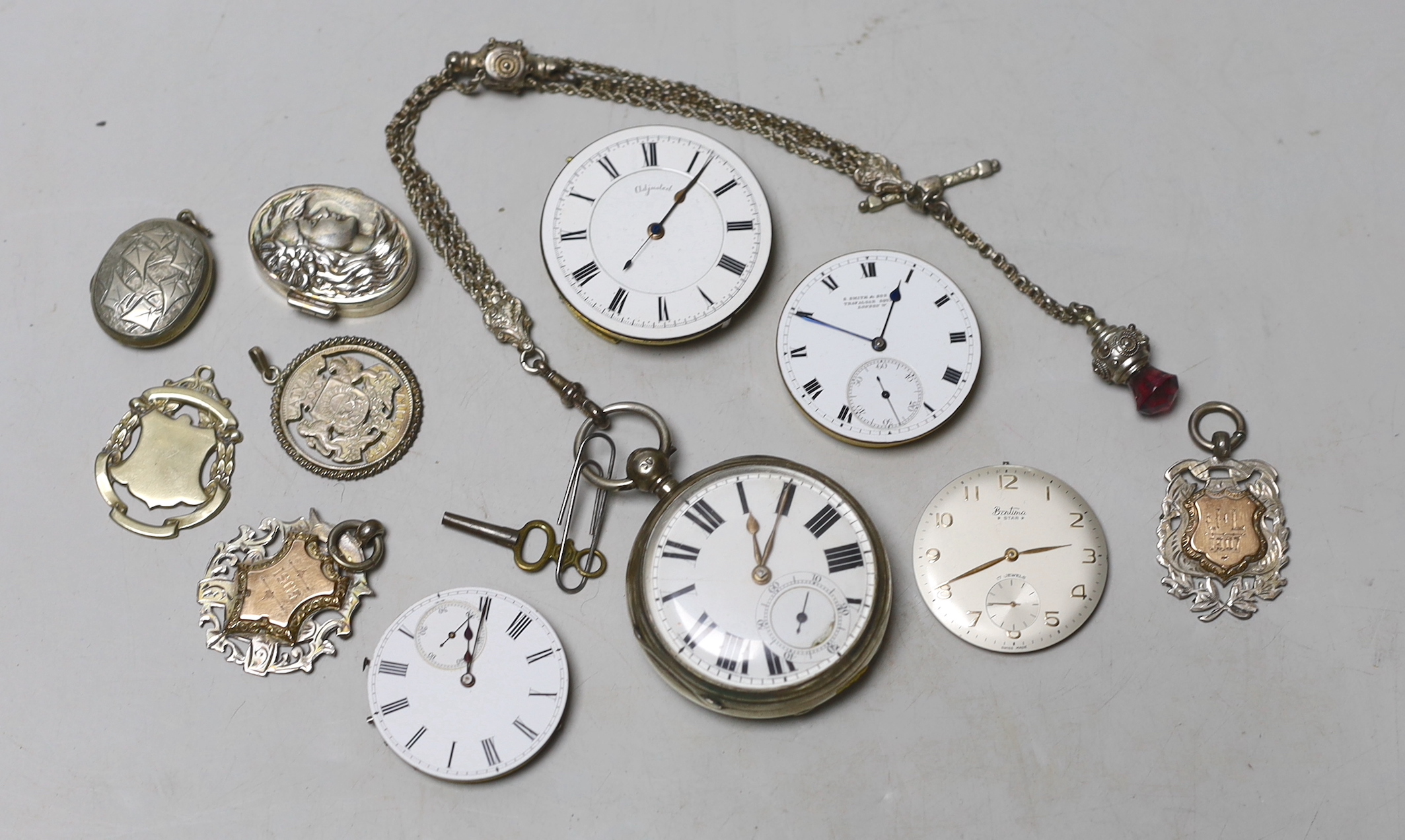 A late Victorian silver open faced pocket watch by J. Williams of Carmarthen, together with other watch movements, pill box, medallions etc.